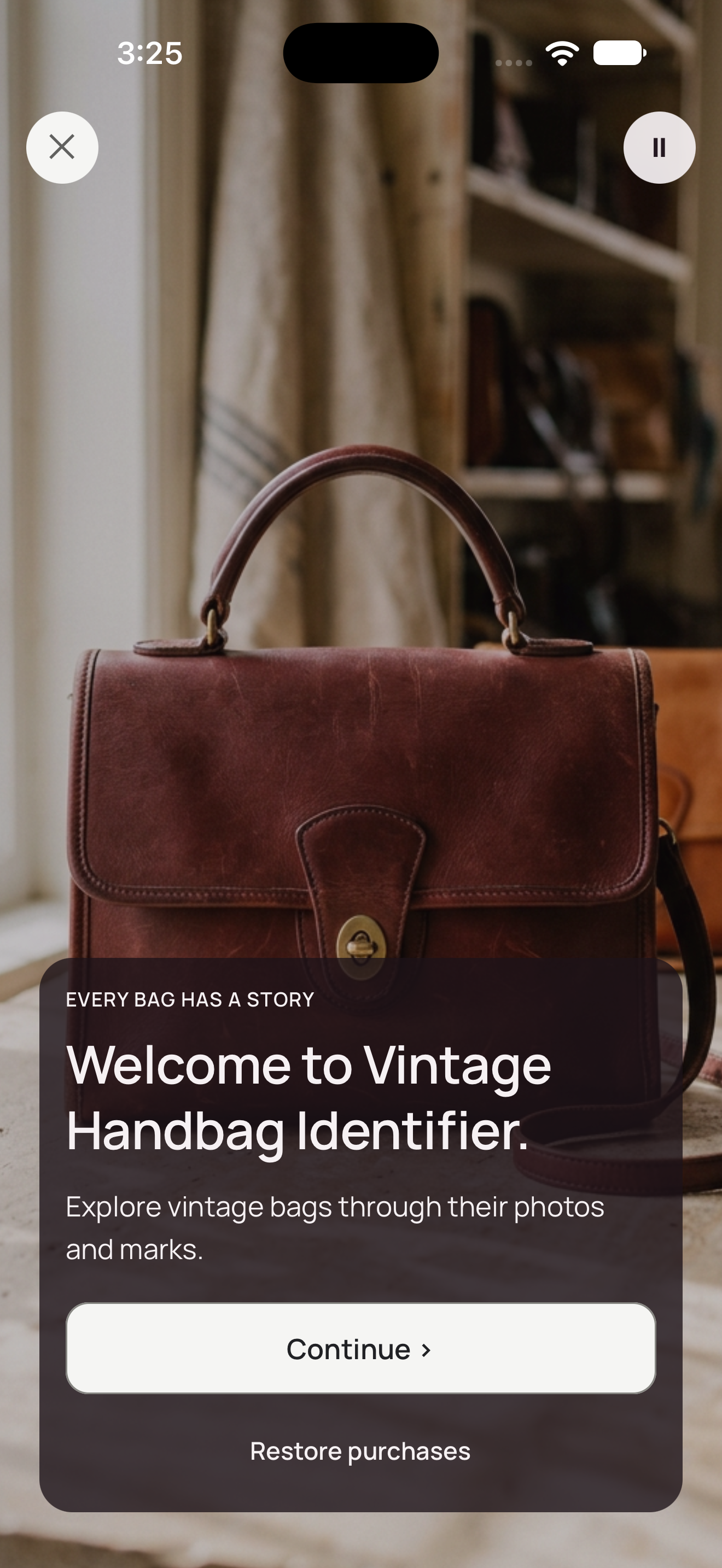 The app welcome screen: Welcome to Vintage Handbag Identifier, explore vintage bags through their photos and marks, over a photograph of a brown leather bag